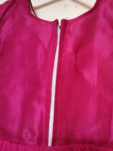Pink Net Dress With Proper Lining Inside.