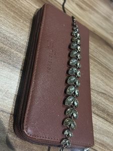 Brown Wallet And A Necklace