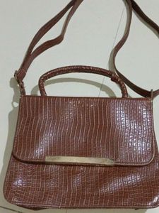 brown handbag crocodile pattern