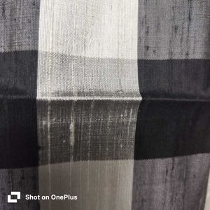 New Raw silk Checked Saree with Tassels