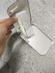 Doll Face Mirror Flip With Comb.