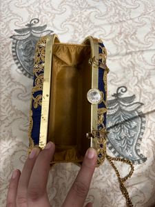 Embroidered box clutch
