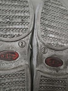 Used white school shoes