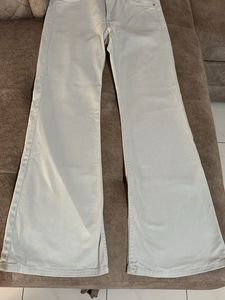 Cream bootcut Jeans