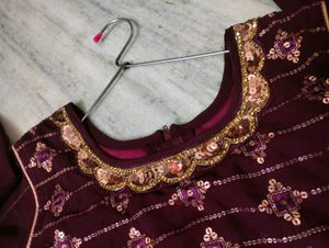 A Beautiful Women Festive Wear Wine Sharara