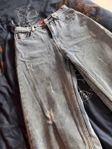 Ripped Light Wash Denim Jeans