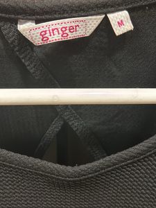 Black Flared Dress With Triangle Back Cutout