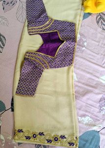 Elegant Creme Saree with Purple Blouse