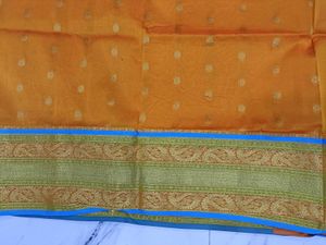 Orange and sky blue combination saree