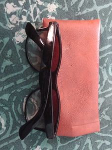 👉 “Black Sunglasses with Case – Good Condition”