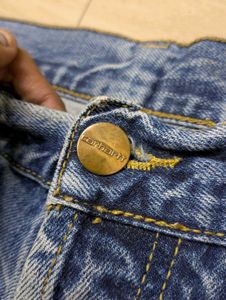 Worn Blue Denim Jeans