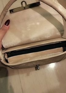 beige baguette bag