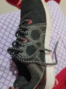 Black athletic running shoes