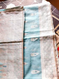 Elegant Aqua Saree with Intricate Paisley Detail