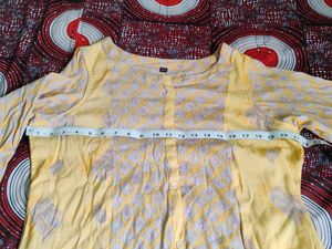Beautiful Yellow Printed Kurti in Good Condition