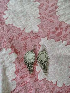 Silver tone bracelet and earrings