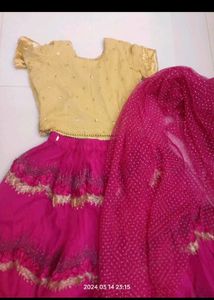 Golden choli and pink ghaghra with dupatta