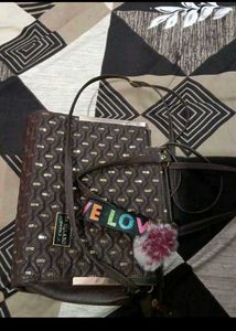 Brown Quilted Handbag with Sequins and Pom-Pom Cha