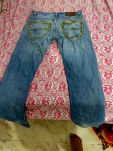 Distressed Denim Jeans