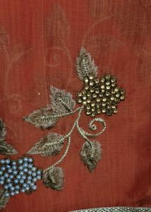 Elegant Orange Embroidered Saree