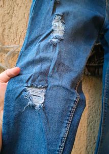 Ripped High-Waisted Skinny Jeans