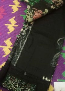 a suit of black printed