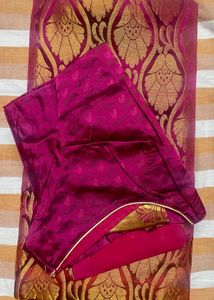 Orange kanchi Pattu Saree With Pink Pallu