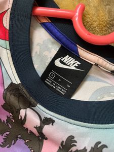 Vibrant Nike Abstract Pattern Crop Top