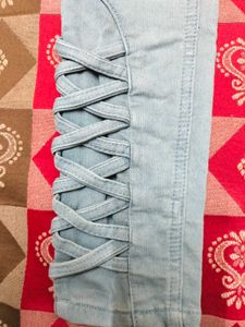Light Blue Jeans With Criss Cross Design