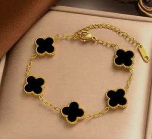 Clover Charm Bracelet - Gold &amp; White