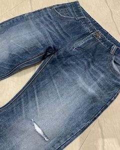 Knee Cut Dark Blue Denim Jeans