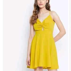 Today&#39;s Offer ₹150 Berrylush Women Solid Yellow Front Twist Knot Fit &amp; Flare Mini Dress For Women (Mustard Colour)