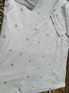 Uniqlo Men Cotton Mix Cream Printed Polo Tshirt