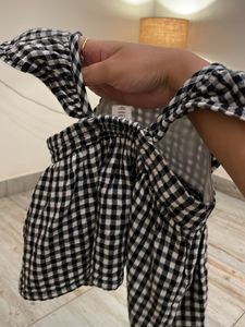 Checked top with flutter sleeves