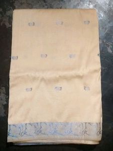 Elegant Cream Saree with Silver Border