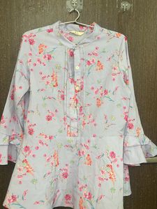 Lavender Peplum Top From AND