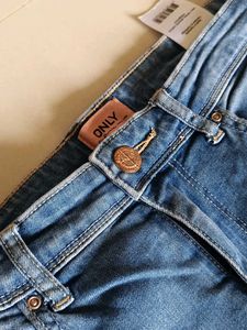 Distressed Blue Denim Jeans