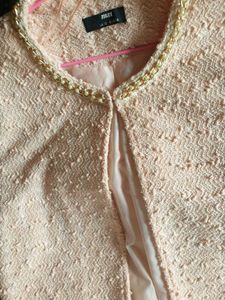 Chic Pearl-Trimmed Blush Jacket