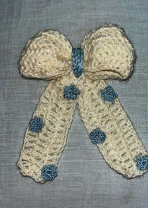 Crocheted Bow with Floral Accents