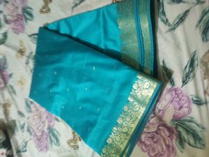 Teal Blue Saree with Gold Border