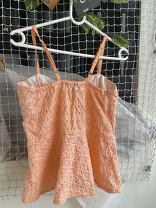 Embroidered Peplum Top