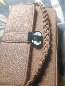 Elegant Wallet with Braided Strap