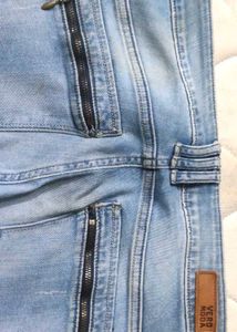 Light Wash Distressed Skinny Jeans