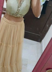 Halter Neck Blouse With Heavy Net Lehnga