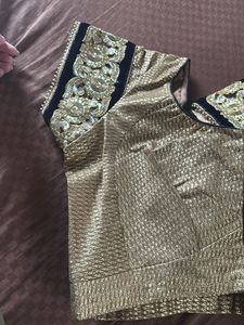 Red Saree With Gold Plates