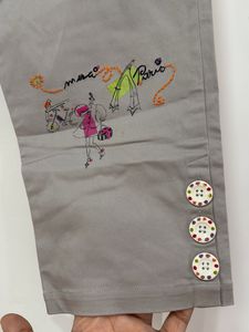 Brand new Capri Pants with Floral Detail