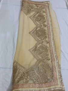 Elegant Gold Embroidered Saree