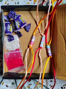 Set Of 3 Rakhi With Roli Chawal And Chocolate