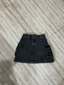 denim skir, white ribbed t shirt and  jac