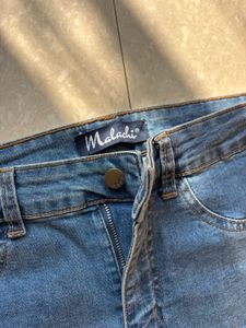 High waisted blue skinny jeans